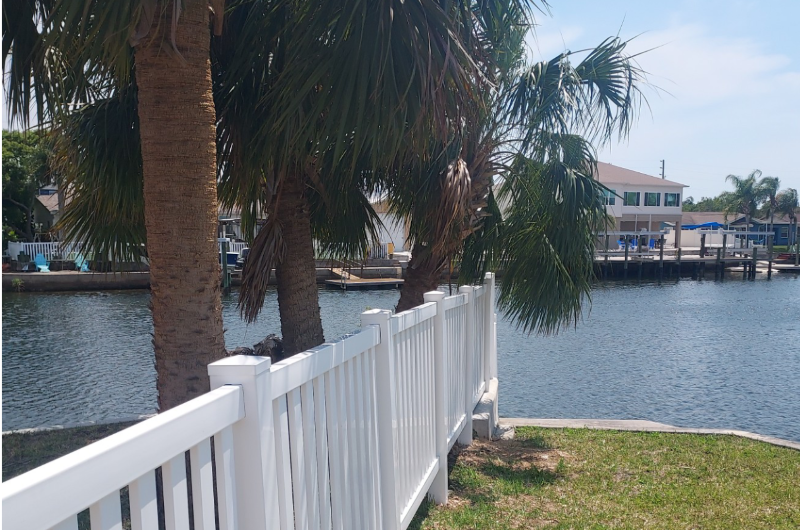 White fence along waterfront